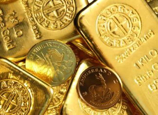 Золото поднялось выше $5000 после исторического обвала. Серебро тоже подорожало