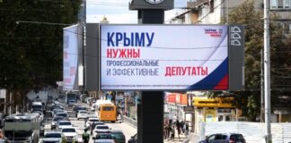 «Щасливі» люди на тлі порожніх бензоколонок». Як анексований Крим під час кризи готують до незаконних виборів до Державної думи Росії
